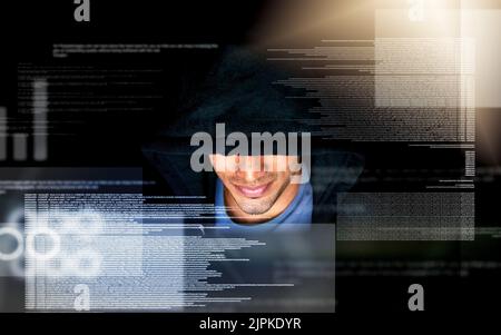 Hes making progress on his new code. a handsome young male computer programmer working on new code. Stock Photo