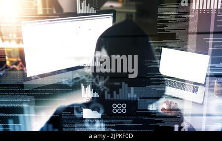 Theres always code running in the background. Rearview shot of an unrecognizable male computer programmer working on new code. Stock Photo