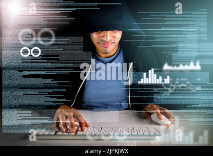 Writing the code that your system runs on. a handsome young male computer programmer working on new code. Stock Photo