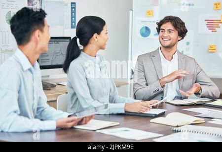 Meeting, marketing vision and kpi performance data for diverse team of talking creative agents to plan ideas or strategy. Motivated, inspired or Stock Photo