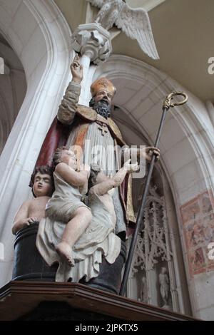 statue of saint nicholas in a basilica in saint-nicolas-de-port in france Stock Photo