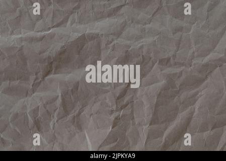 crinkled brown paper texture, full frame recycling paper background Stock Photo