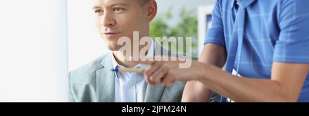 Two business persons are working on project together Stock Photo