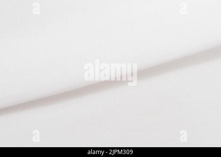 Macro Photo of white fabric texture background. Pattern of white woven clothing material. High quality photo Stock Photo