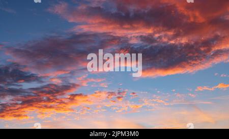 Colorful clouds and sky during sunset with red and blue Stock Photo