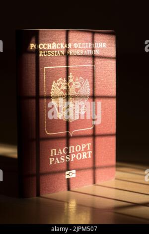 Russian foreign passport. Prohibition of Schengen visas for Russian tourists to travel to the European Union concept. High quality photo Stock Photo