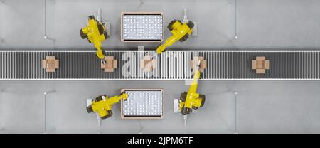 Robots at a conveyor belt packing items into cardboard packages. Top view. Stock Photo