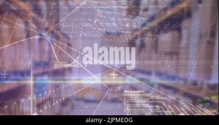 Image of financial data and graphs over warehouse Stock Photo
