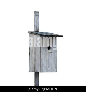 Wooden old birdhouse for small birds. Isolated on a white background. Stock Photo