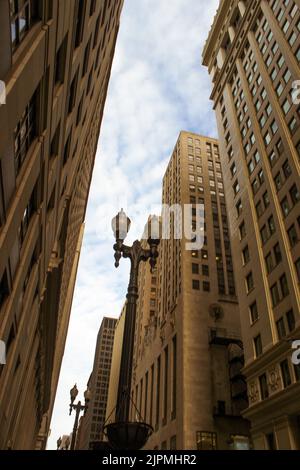 A low angle shot of the old tall buildings in downtown Chicago Stock Photo