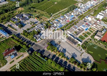 CHUZHOU, CHINA - AUGUST 14, 2022 - Aerial photo taken on Aug 14, 2022 shows Xiaogang village, Xiaoxihe town, Fengyang county, Chuzhou City, Anhui Prov Stock Photo