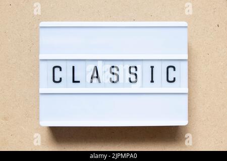 Lightbox with word classic on wood background Stock Photo