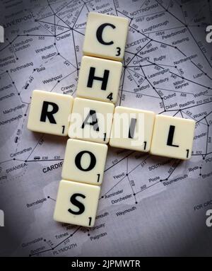 Rail chaos caused by delays, cancellations, strikes and industrial action, across the British train transport network - RMT, ASLEF in Scrabble letters Stock Photo