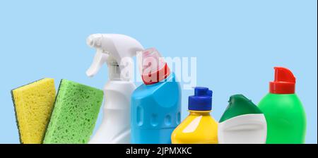 A plastic bottles with Household cleaning product on a blue background Stock Photo