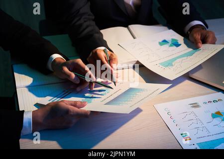 Professional financial analysts working with financial documents Stock Photo