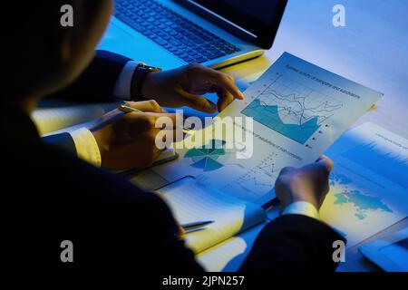 Hands of business executives analyzing company activity Stock Photo