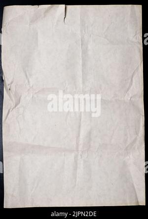 Old paper on a black background Stock Photo