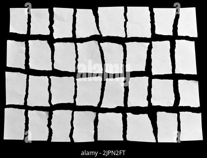 White torn paper on black background Stock Photo