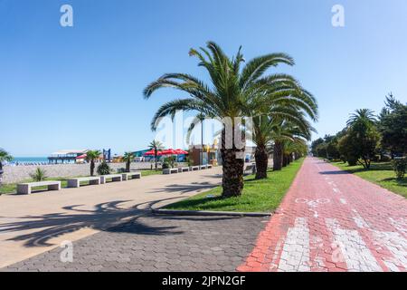 Batumi boulevard. Seaside promenade in with cycle line. Batumi, Georgia - July 2, 2021 Stock Photo