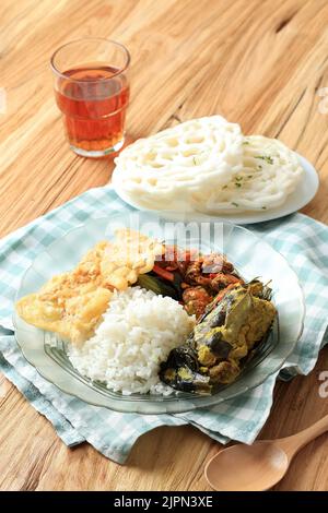 Nasi Rames or Nasi Campur, Mix Rice with Various Side Dish Stock Photo