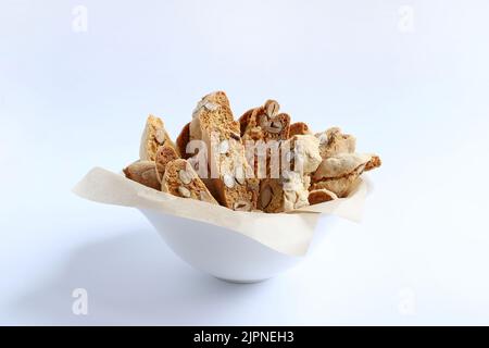 Cantucci, traditional Italian almond cookies from Tuscany on white background. Stock Photo