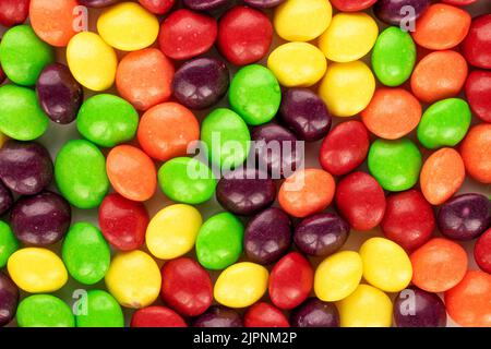 A lot of sweet colored candies, close-up, top view. Stock Photo