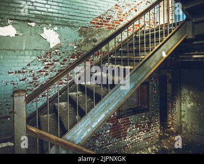 An old wooden stairs in an old house Stock Photo