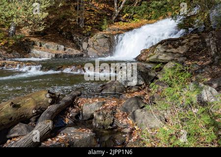 Deep in Northern Ontario's Cottage Country (Muskoka), the usually deserted Hatchery Falls is a lovely sight in the autumn. Stock Photo