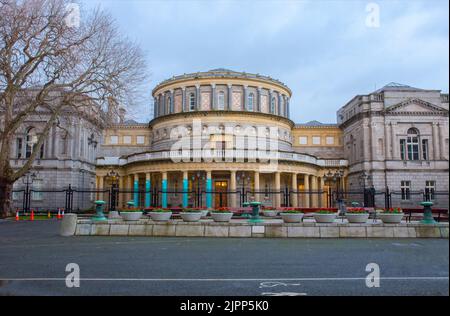 National Library of Ireland at dusk, Dublin. View from National Museum of Archeology Stock Photo