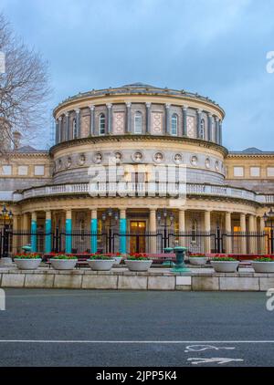 National Library of Ireland at dusk, Dublin. View from National Museum of Archeology Stock Photo