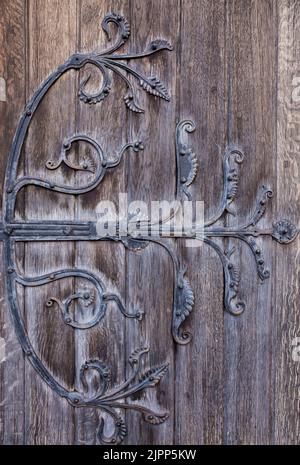 Christ Church Cathedral ground door, Dublin, Ireland. Decorated hinges detail Stock Photo