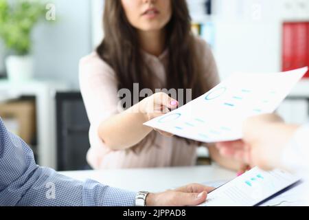 Team workflow and analysis of marketing reports Stock Photo