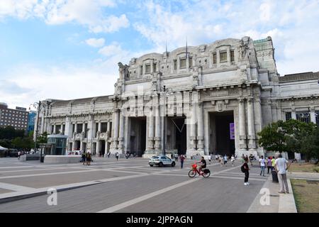 MILAN, ITALY - AUGUST 15, 2022: Historical main train or railway station, Milano Centrale, opened in 1931. Stock Photo