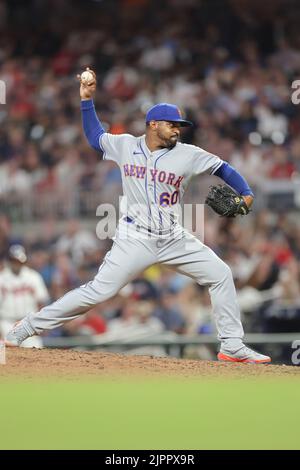 ATLANTA, GA - SEPTEMBER 30: Atlanta Braves relief pitcher A.J. Minter (33)  delivers a pitch during the Friday evening MLB game between the New York  Mets and the Atlanta Braves on September