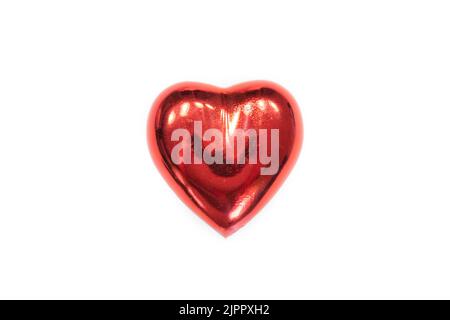 volumetric red heart on a white background. Stock Photo