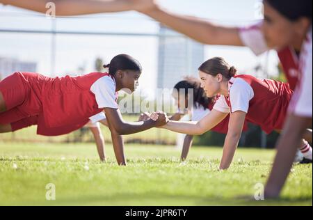 Teamwork, sports and health with a team training together in collaboration or solidarity for practicing and exercise in wellness, sport and fitness Stock Photo