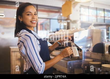 Barista preparing drink in coffee shop, cafe startup and hospitality restaurant. Portrait of friendly waitress, happy bistro worker and young woman Stock Photo
