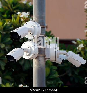cctv camera operating system fixed on a public place Stock Photo