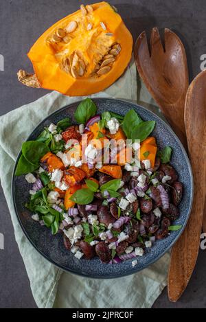 Vegetable salad in bowl, avocado, sweet potato, beans Stock Photo