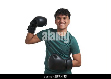 Young peruvian boxer smiling and doing strong pose, isolated. Stock Photo