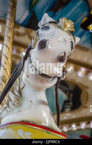 Novi Sad, Serbia - December 13. 2019: Downtown Novi Sad. The decorations on the children's carousel with wooden horses Stock Photo