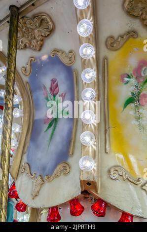 Novi Sad, Serbia - December 13. 2019: Downtown Novi Sad. The decorations on the children's carousel with wooden horses Stock Photo