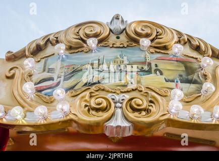 Novi Sad, Serbia - December 13. 2019: Downtown Novi Sad. The decorations on the children's carousel with wooden horses Stock Photo