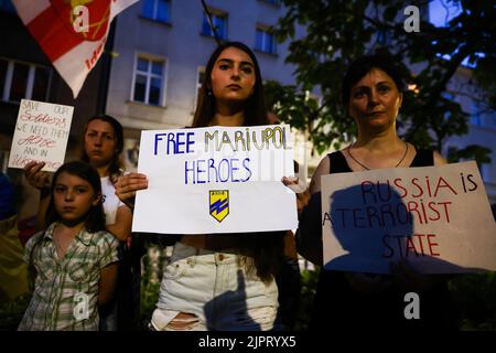 Krakow, Poland. 19th Aug, 2022. Ukrainians protest in front of the Consulate General of Russia in support of prisoners of war of Azovstal 4308 regiment defenders and against Russian invasion of Ukraine. Krakow, Poland on August 19, 2022. The Azov Regiment was among the Ukrainian units that defended the steelworks in the city of Mariupol for nearly three months before surrendering in May under relentless Russian attacks from the ground, sea and air. (Credit Image: © Beata Zawrzel/ZUMA Press Wire) Stock Photo