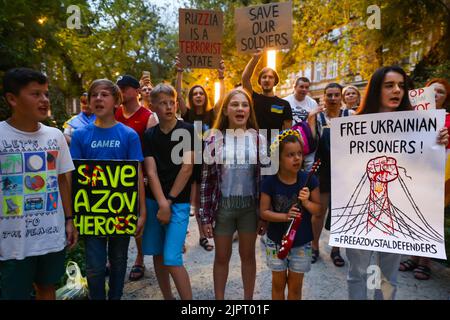 August 19, 2022, Krakow, Poland: Ukrainians protest in front of the Consulate General of Russia in support of prisoners of war of Azovstal 4308 regiment defenders and against Russian invasion of Ukraine. Krakow, Poland on August 19, 2022. The Azov Regiment was among the Ukrainian units that defended the steelworks in the city of Mariupol for nearly three months before surrendering in May under relentless Russian attacks from the ground, sea and air. (Credit Image: © Beata Zawrzel/ZUMA Press Wire) Stock Photo