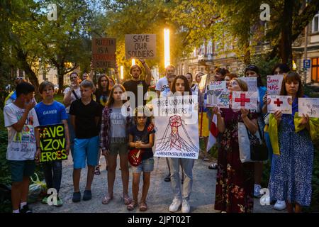 Krakow, Poland. 19th Aug, 2022. Ukrainians protest in front of the Consulate General of Russia in support of prisoners of war of Azovstal 4308 regiment defenders and against Russian invasion of Ukraine. Krakow, Poland on August 19, 2022. The Azov Regiment was among the Ukrainian units that defended the steelworks in the city of Mariupol for nearly three months before surrendering in May under relentless Russian attacks from the ground, sea and air. (Credit Image: © Beata Zawrzel/ZUMA Press Wire) Stock Photo
