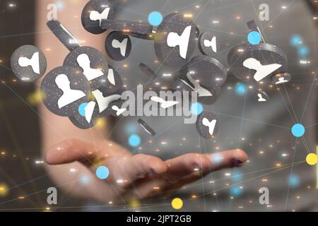 The 3d rendered profile icons hovering over a man's hand Stock Photo