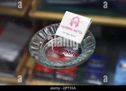 Signs and various souvenirs in a souvenir shop. An ashtray from The New Aladdin hotel and casino, Las Vegas, Nevada, US. Stock Photo