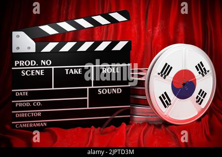 South Korean cinematography, film industry, cinema in South Korea, concept. Clapperboard with and film reels on the red fabric, 3D rendering Stock Photo