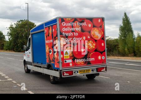 Datchet, Berkshire, UK. 20th August, 2022. A Tesco delivery van out on the road in Datchet. Following an IT glitch yesterday which meant supermarket giant Tesco, were unable to make home deliveries, today delivery vans were back out on the road again. Credit: Maureen McLean/Alamy Live News Stock Photo